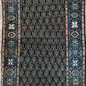 Vintage 1940s Persian Farahan Sarouk hand-knotted wool area rug 3.9' x 5.10' with a dark floral field and cobalt blue outer border.