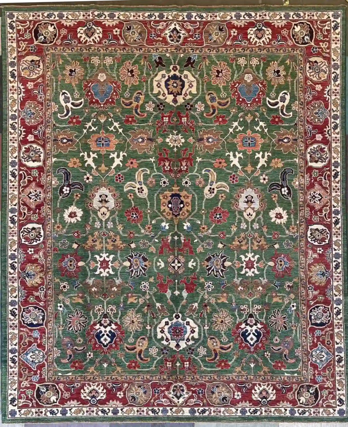 hand-knotted-chobi-wool-area-rug-8-5-x-10-7-olive-green-crimson-sku-112525-12.webp | McFarlands Carpet and Rug Service Olive green hand-knotted Chobi wool area rug 8.5' x 10.7' with an all-over symmetrical floral design and crimson red border.