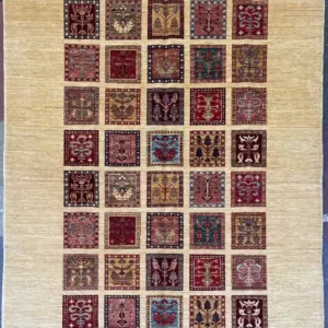 garden-panel-chobi-wool-rug-5x7.webp | McFarlands Carpet and Rug Service Multicolor hand-knotted garden panel Chobi wool area rug 5.6' x 7.3' showcasing a forty compartment floral and tree motif grid.