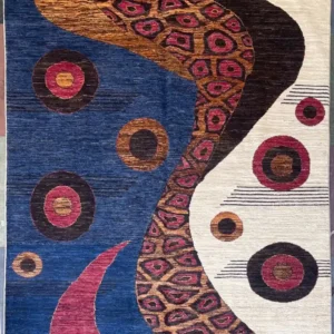 Abstract Organic Modern Wool Rug | 5.10' x 7.9'. | McFarlands Carpet and Rug Service Contemporary abstract hand-knotted wool area rug 5.10' x 7.9' featuring a split blue and cream design with a winding magenta cell band.