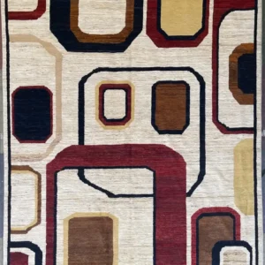 mid-century-modern-abstract-geometric-rug-6x9.webp | McFarlands Carpet and Rug Service Red, navy, and tan abstract geometric frame hand-knotted wool area rug 5.11' x 8.2' with a Mid-Century Modern squircle pattern on a cream field.