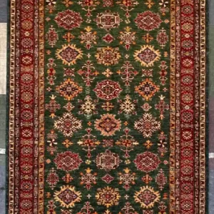 traditional-green-kazak-runner-rug.webp | McFarlands Carpet and Rug Service Traditional green Kazak hand-knotted wool runner rug 4.10' x 13' featuring geometric red and gold tribal medallions.