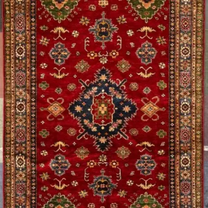 traditional-red-kazak-medallion-rug-6x10.webp | McFarlands Carpet and Rug Service Traditional red Kazak hand-knotted wool area rug 6.1' x 10.3' featuring a large geometric navy center medallion and green corners.