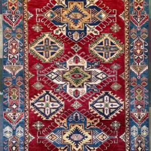 traditional-red-kazak-medallion-wool-rug-6x9.webp | McFarlands Carpet and Rug Service Traditional red Kazak hand-knotted wool area rug 6.3' x 10.4' featuring three large navy and ivory center medallions with a blue tribal border.
