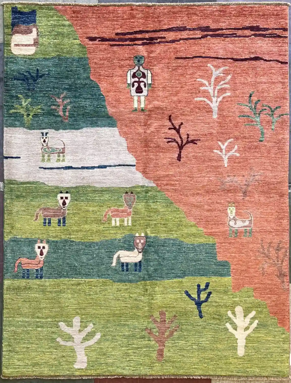 modern-pictorial-terracotta-green-wool-rug.webp | McFarlands Carpet and Rug Service Modern hand-knotted pictorial wool area rug 4.10' x 6.2' featuring an asymmetrical desert landscape layout in terracotta orange and blocky tiers of green and teal.