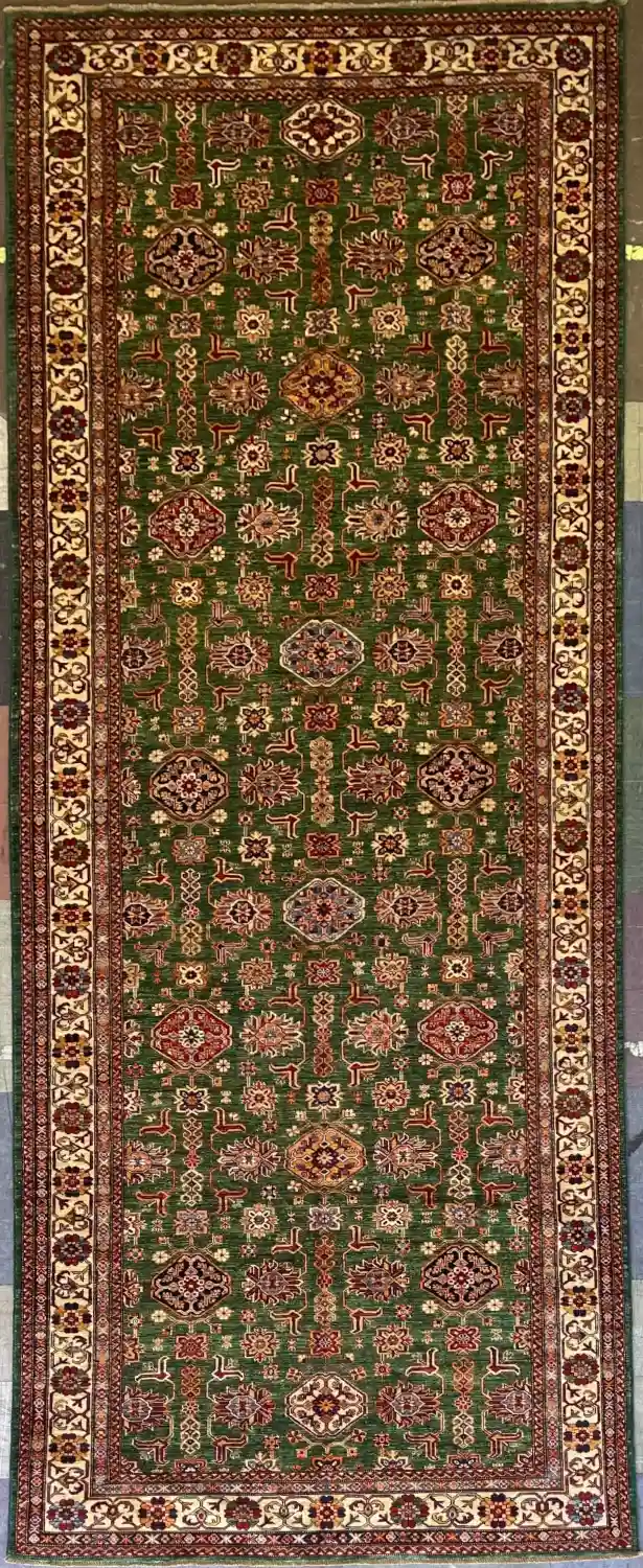 traditional-green-kazak-wool-runner-rug-6x16.webp | McFarlands Carpet and Rug Service Traditional green Kazak hand-knotted wool runner rug 6' x 16' featuring a vertical geometric medallion layout and a wide ivory border frame.