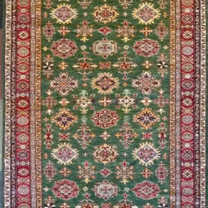 Traditional green Kazak hand-knotted wool extra-wide runner rug 4.9' x 12.6' featuring a dense vertical geometric medallion layout and a wide red border frame.