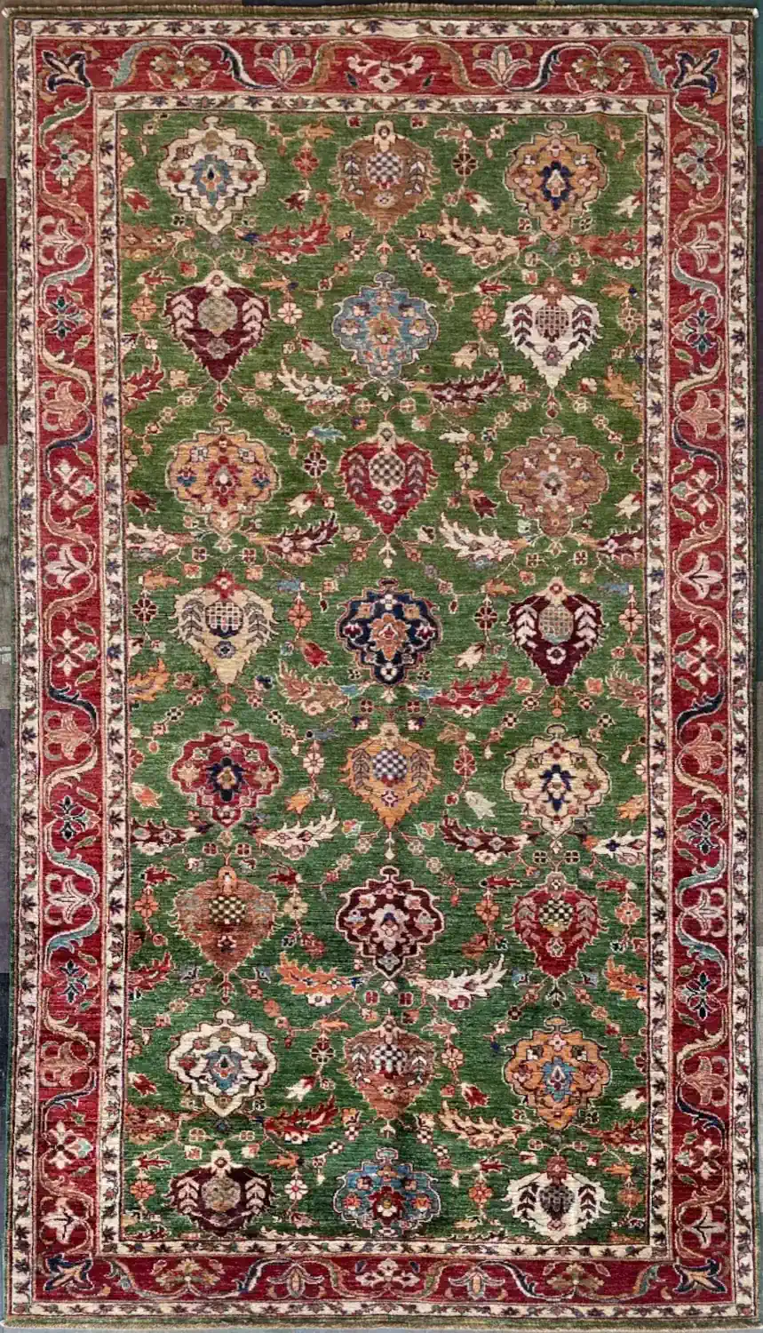 sage-moss-green-all-over-medallion-chobi-peshawar-wool-area-rug-6x9.webp | McFarlands Carpet and Rug Service Hand-knotted Chobi Peshawar wool area rug 5.2' x 9.0' with sage moss green field, all-over medallion pattern, and crimson red border.