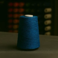 Blue rug serging yarn spool