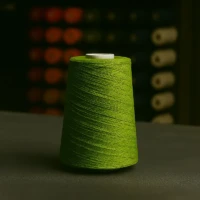 Green rug serging yarn spool