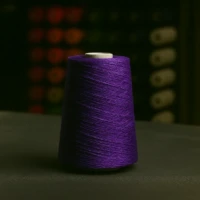 Purple rug serging yarn spool