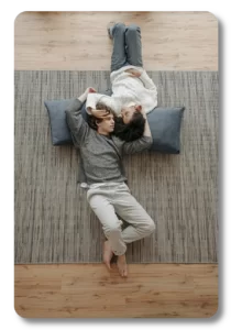 Service #244424 Status changed from SERVICE_PENDING to SERVICE_COMPLETED | McFarlands Carpet and Rug Service Photo of a couple laying on rug